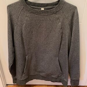 Lululemon grey crewneck pullover with a front pocket area
